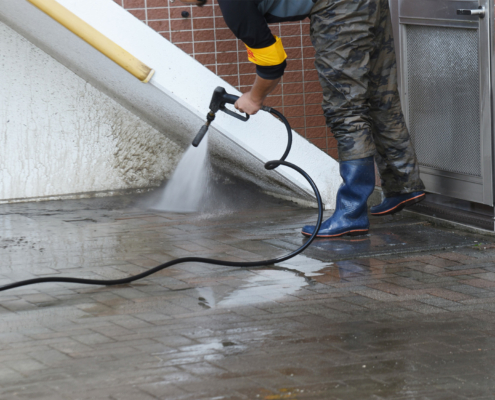 A scene of a tile cleaning work site, commercial power washing